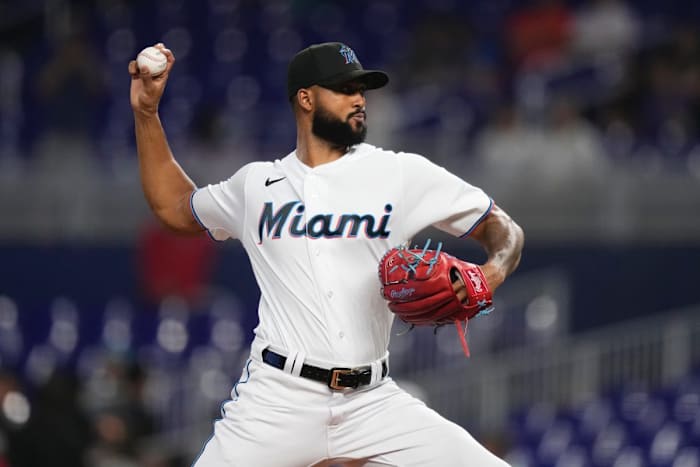 Sandy Alcantara winds up to throw a pitch.